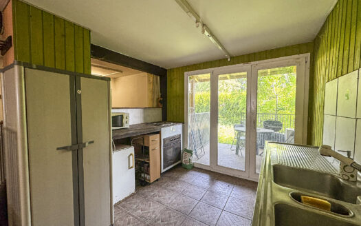 Maison villageoise au cœur de Gumefens – Beau potentiel sur 830 m²
